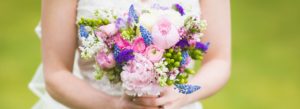 Detail of a bride holding her bouquet