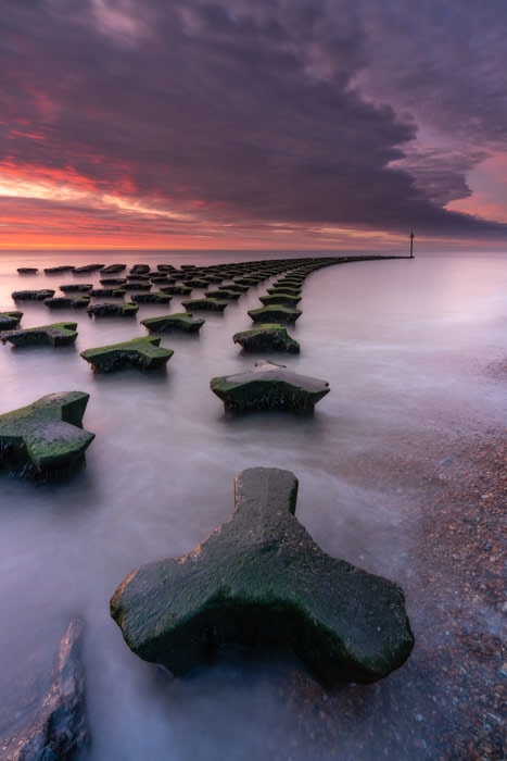 Long exposure of Cobbolds Point in Felixstowe at sunrise